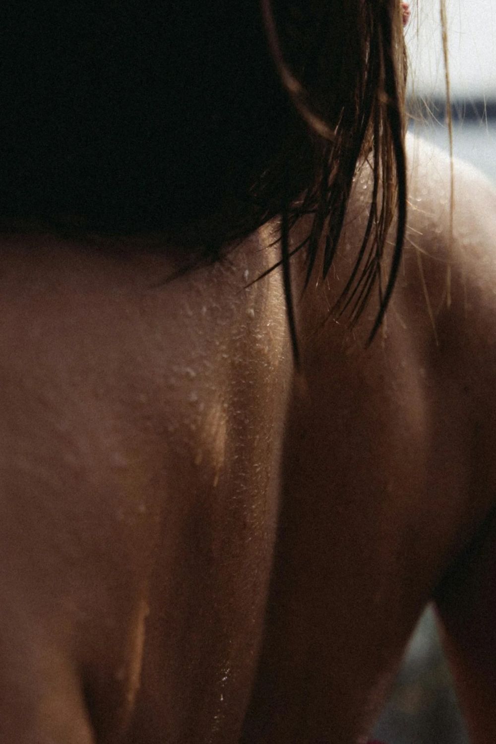 Wet shoulder and hair, after the water
